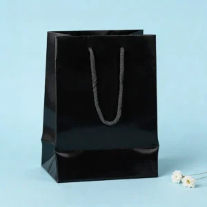 Bolsa papel plastificado negro 16x23cm bautizo