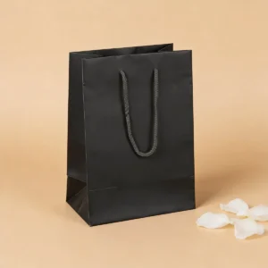 Bolsa papel plastificado negro 16x23cm comunión
