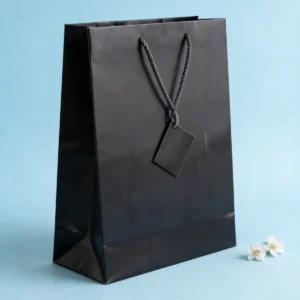 Bolsa papel plastificado negro 26x36cm bautizo