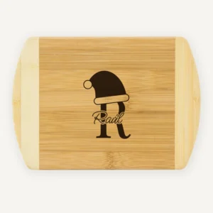 Tabla de cortar de Navidad con inicial, gorro de Papá Noel y nombre
